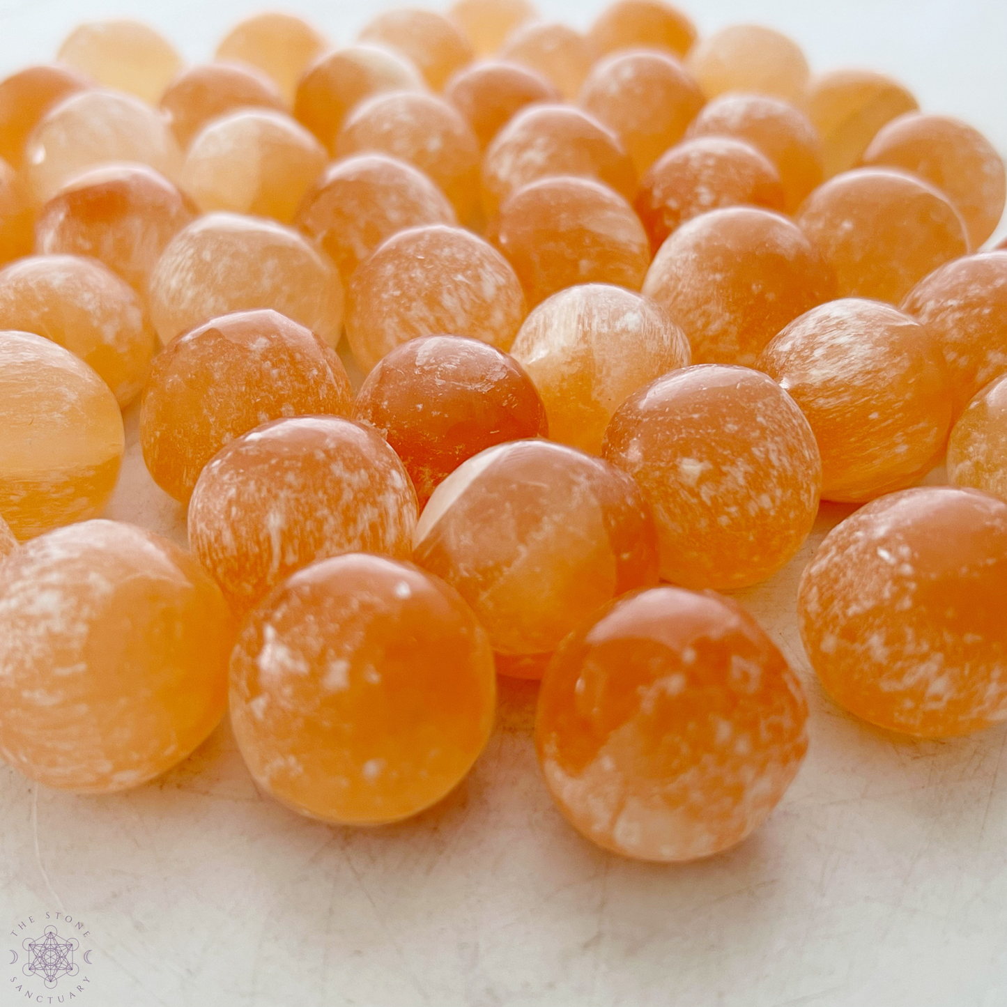 Orange Selenite Tumbled Sphere Stones