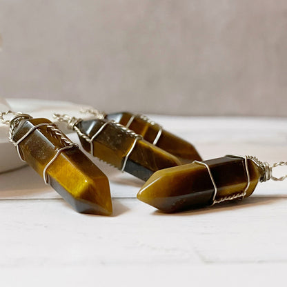 1.5" Double Terminated Tiger Eye Point Pendant