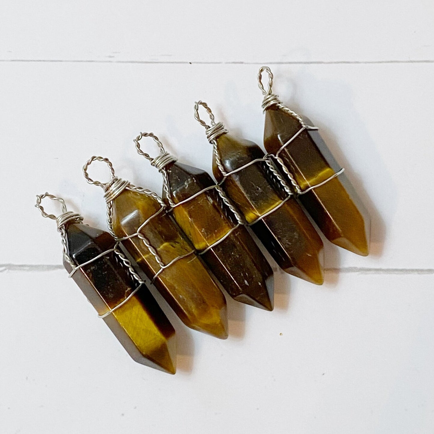 1.5" Double Terminated Tiger Eye Point Pendant