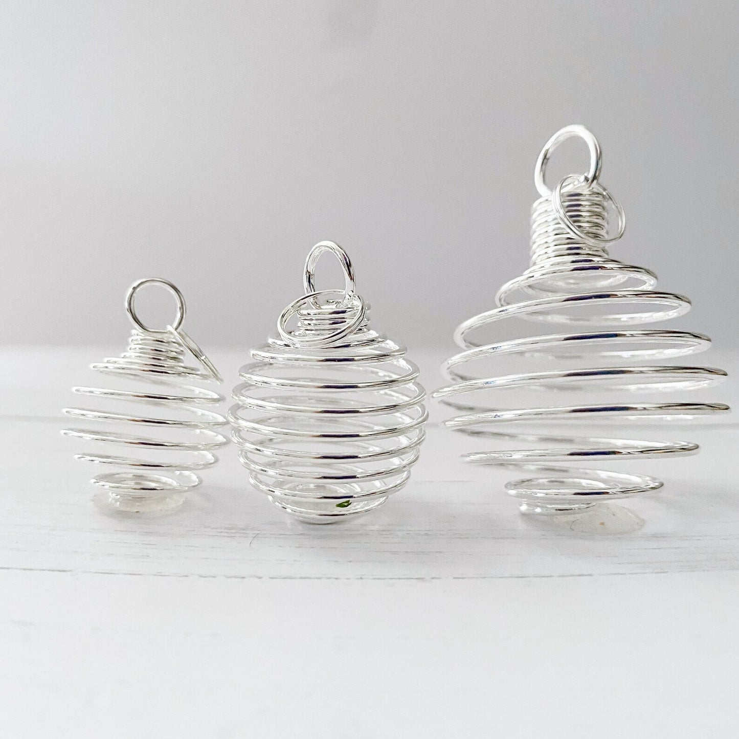 Empty Spiral Cage Spring Pendant