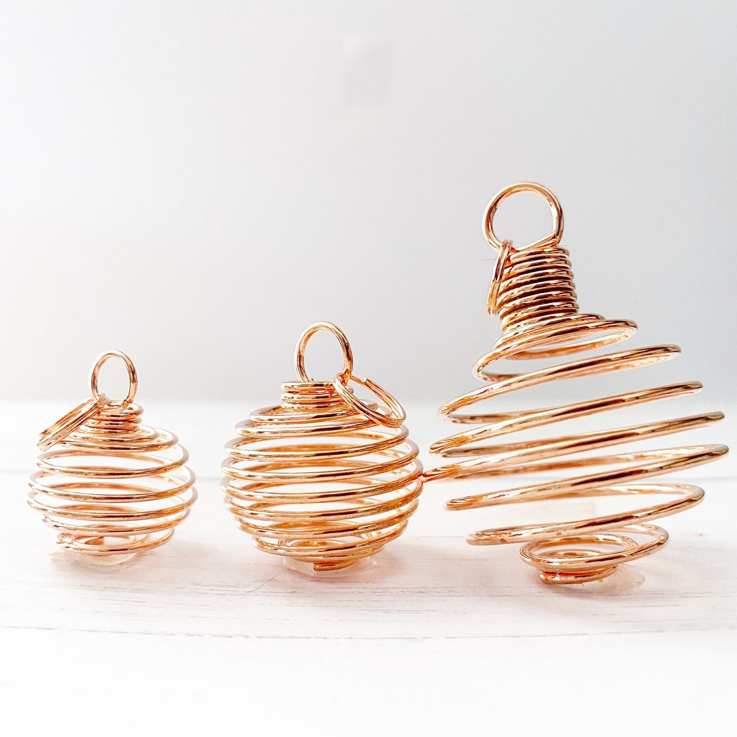 Empty Spiral Cage Spring Pendant