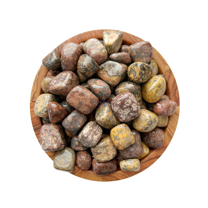 A wooden bowl filled with various polished jasper stones, including vibrant Leopard Skin Jasper Tumbled Stones, displays a range of earthy colors like browns, yellows, greens, and reds. The smooth stones have unique patterns and serve as animal totems and protection stones. The background is plain white.