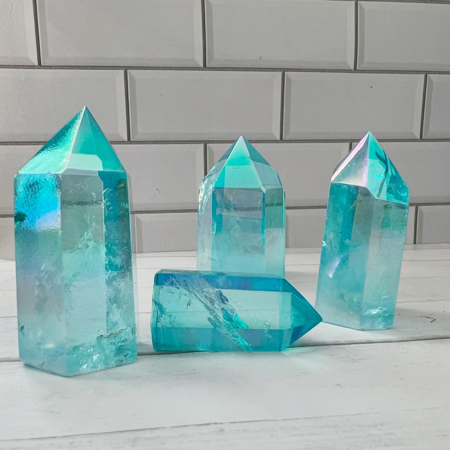 2-4" Polished Aqua Aura Quartz Point