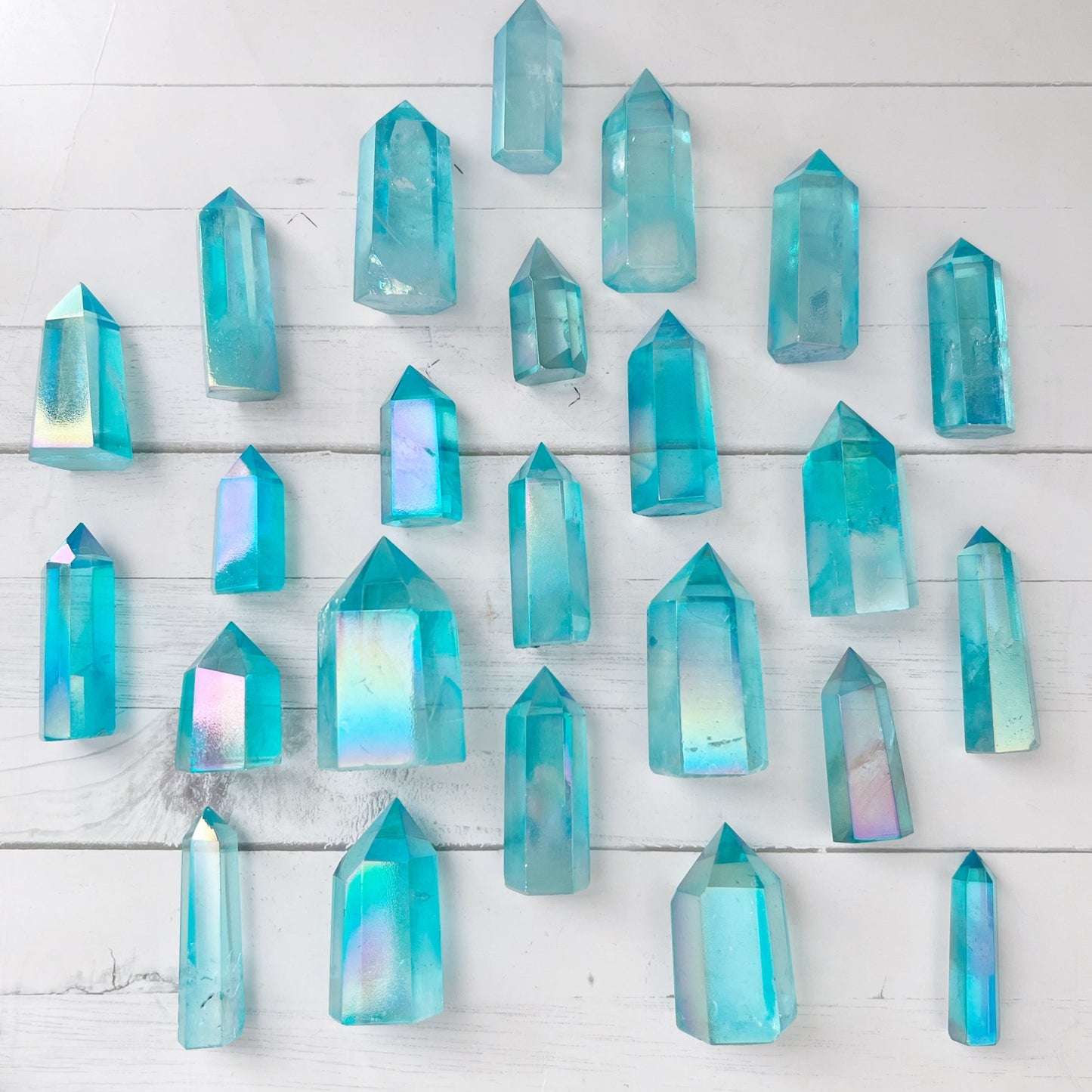 2-4" Polished Aqua Aura Quartz Point