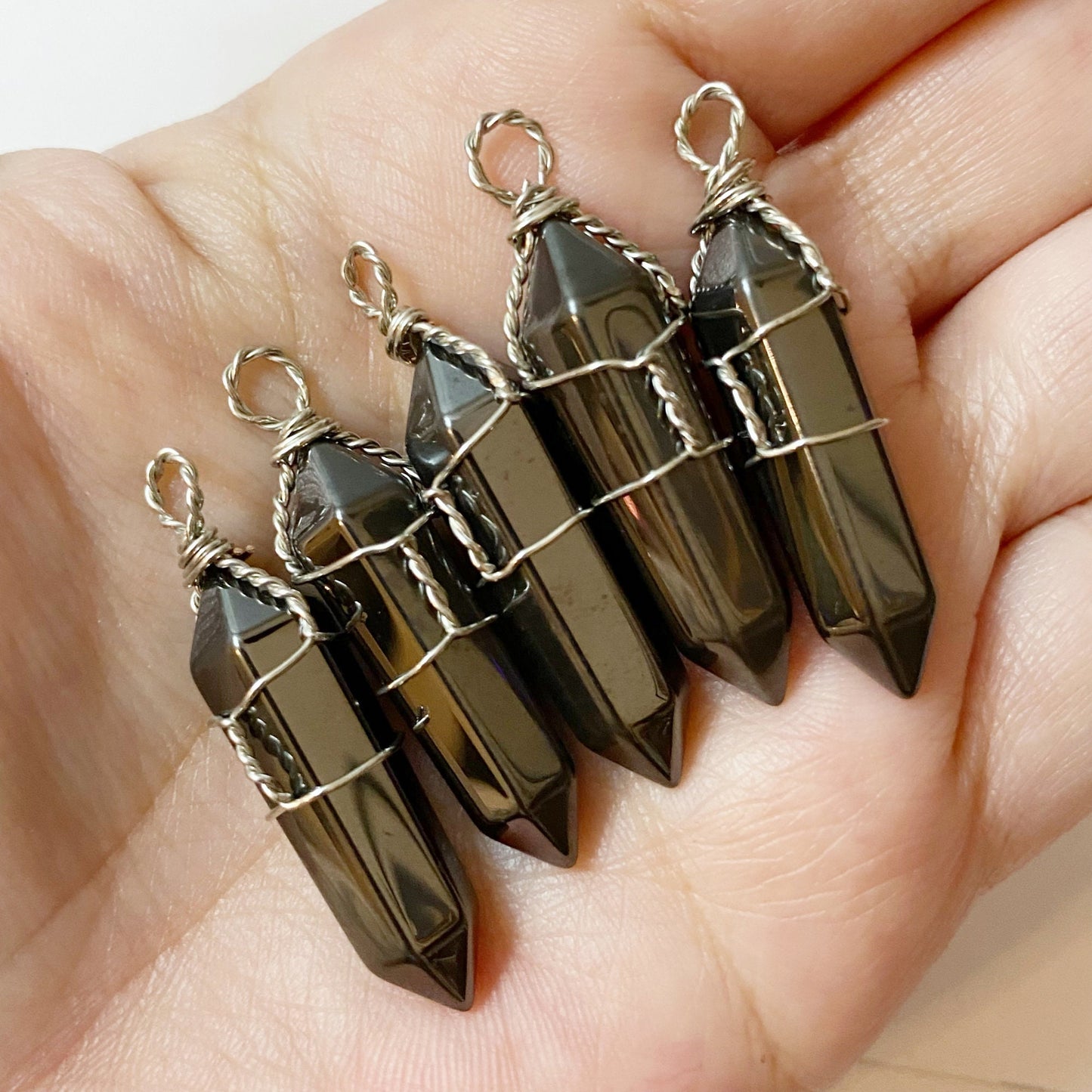 1.5" Double Terminated Hematite Point Pendant